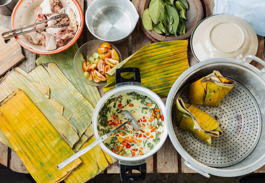 Top view of Indonesian banana leaf wrapped food prep
