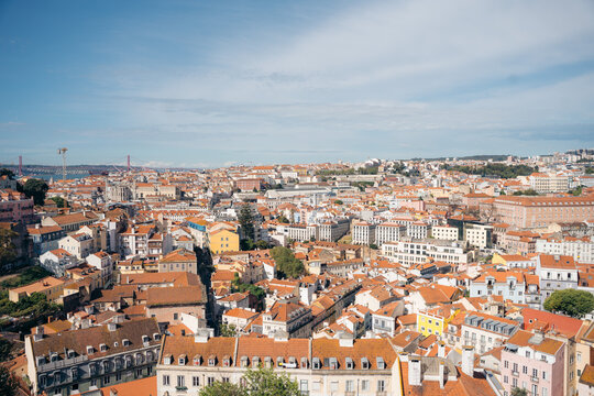 Panoramic Lisbon skyline with red roofs and River view