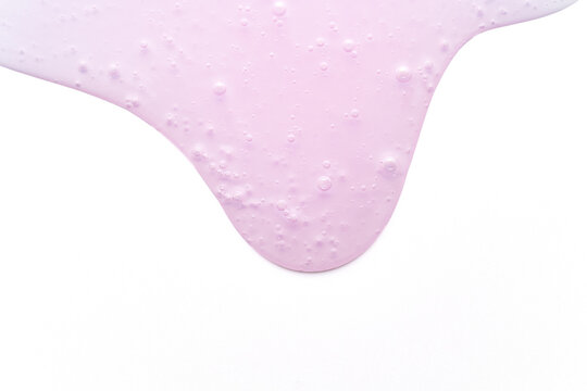 Pink gel with bubbles on a white background