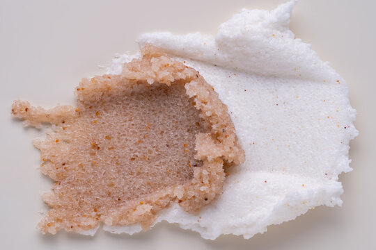Body scrub smear texture on clean background closeup