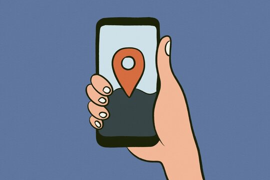 Hand holding smartphone with location pin for mobile navigation