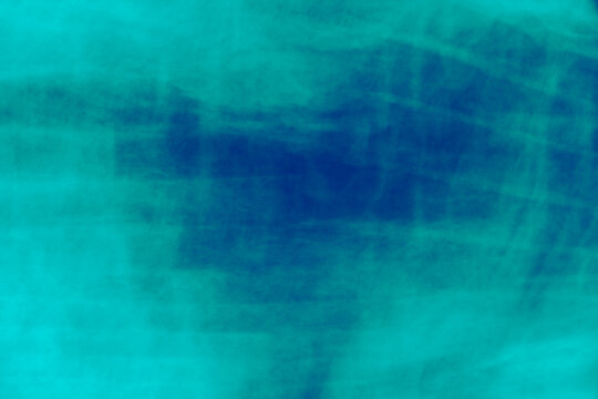 Abstract teal and blue motion blur texture background