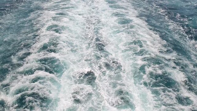 Wake of a ship at sea showing the ocean water pattern
