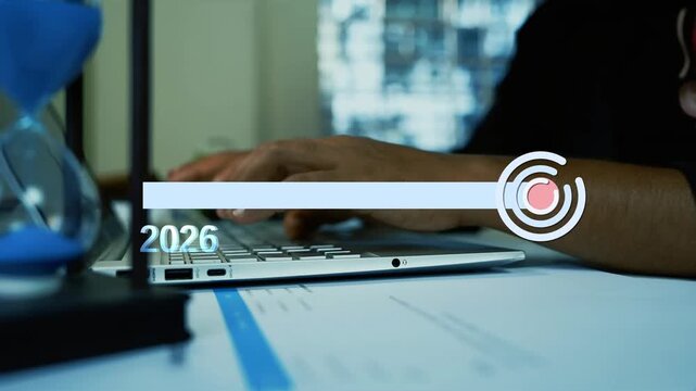 Businessman working on laptop computer with holographic 2026 to 2027 loading bar, Business planning with laptop and hourglass, 2026 to 2027 progress hud
