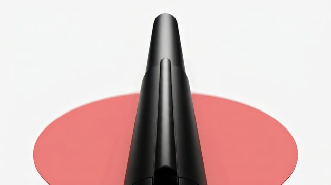 Close-up of black eyeliner pen tip on pink background, isolated on white, cosmetic product for eye makeup