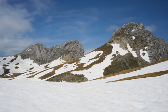 Snowy peaks and alpine meadows in Hecho Valley Pyrenees