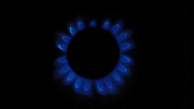 kitchen gas stove with blue and red flame
