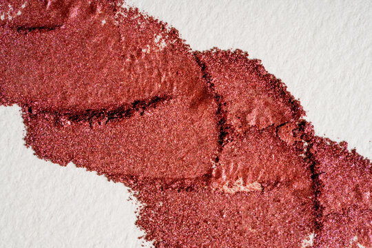 Shimmer eyeshadow swatch texture in rose copper pigment