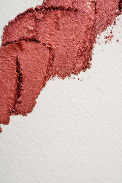 Shimmer eyeshadow swatch with rose gold makeup texture