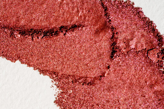 Shimmer eyeshadow swatch texture in rose copper pigment