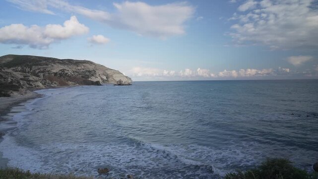 View of coastline near Petra tou Romiou or Aphrodite's rock during golden hour, Paphos District, Cyprus