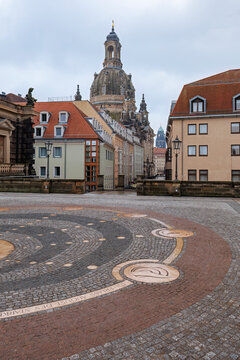 Historic old town street leading to Frauenkirche in Dresden