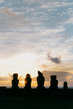 Moai statues at sunset on Easter Island, Chile