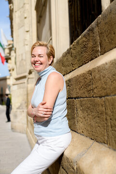 Smiling woman enjoying slow travel holiday in Lecce, Puglia