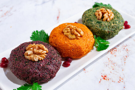 assortment of Phali, three types, pumpkin, spinach and beetroot, Georgian dish, appetizer with nuts and spices, no people, homemade,