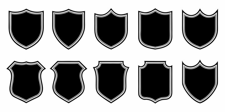 collection of black shield shapes on a white background