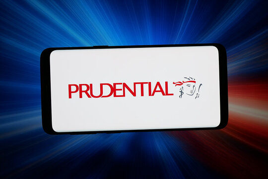 Stuttgart, Germany - 05-18-2026: In this photo illustration, the logo of British insurance company Prudential plc is displayed on a smartphone in front of abstract background on computer screen.