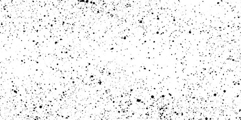 Fototapeta premium Grunge texture background with black ink splatters on white paper surface