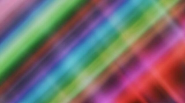 Vibrant diagonal stripes of spectrum colors create an energetic and dynamic visual texture, perfect for abstract art, digital design, and creative backdrops