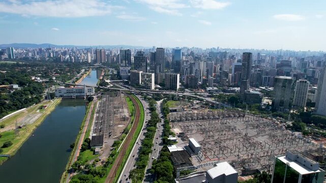 SAO PAULO, BRAZIL - MAY 2026: Aerial view of the Marginal Pinheiros highway with river reflection.
