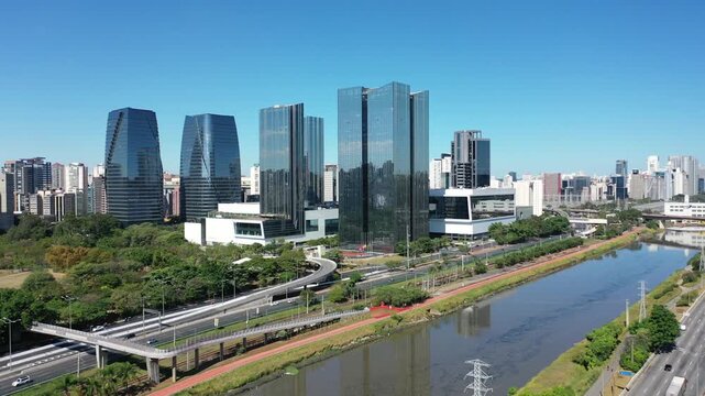 SAO PAULO, BRAZIL - MAY 2026: Aerial view of the Marginal Pinheiros highway with river reflection.