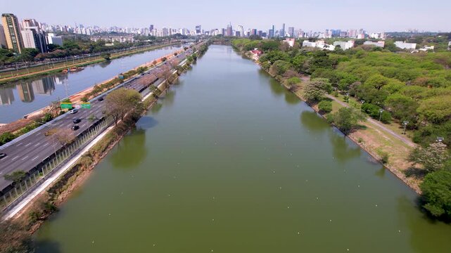 SAO PAULO, BRAZIL - MAY 2026: Aerial view of the Marginal Pinheiros highway with river reflection.