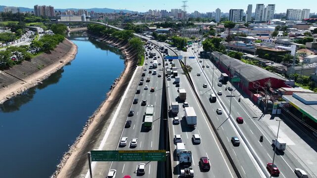 SAO PAULO, BRAZIL - MAY 2026: Aerial view of the  Marginal Pinheiros highway with river reflection.