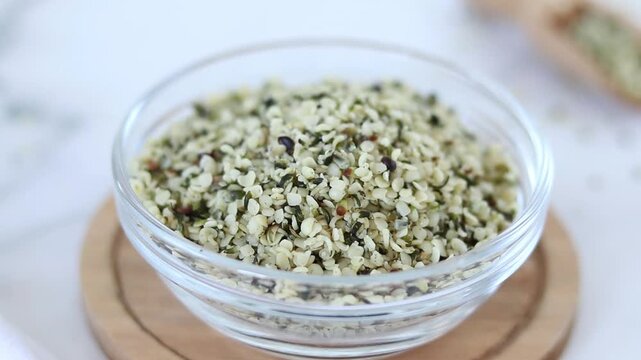 Hemp seeds in a bowl. Close-up.