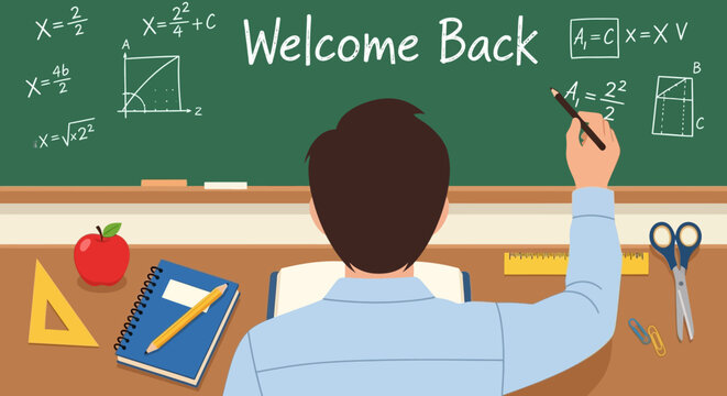 Man sitting at desk writing on chalkboard with welcome back text.