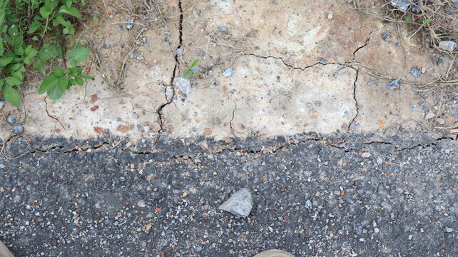 Cracked earth and asphalt texture