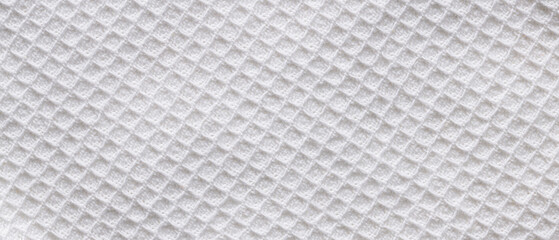Fototapeta premium White waffle cotton fabric texture background with diamond pattern for clean soft textile backdrop