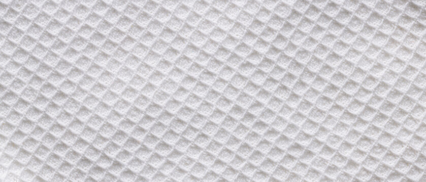 White waffle cotton fabric texture background with diamond pattern for clean soft textile backdrop