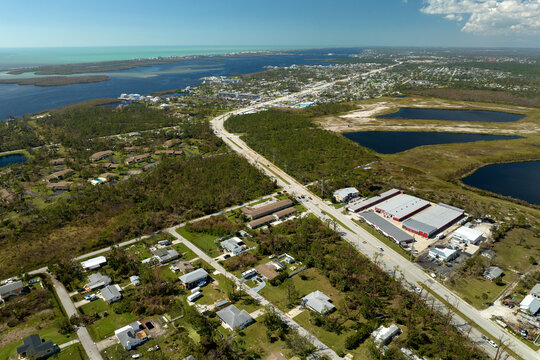 Florida Southwest region after hurricane season. Collapsed and damaged mobile homes in rural residential area. Consequences of severe natural disaster