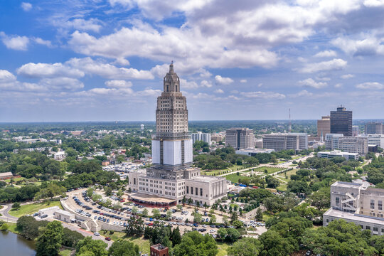 Baton Rouge Louisiana &mdash; Louisiana State Capitol Tower with Renovation Scaffolding Aerial Downtown Baton Rouge Background