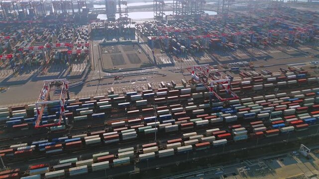 Drone view of intermodal rail yard and gantry cranes at Long Beach port