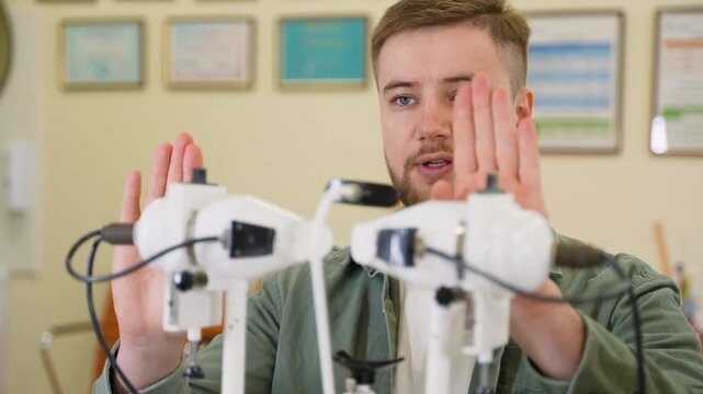 Ophthalmologist checking patient vision with synoptophore machine