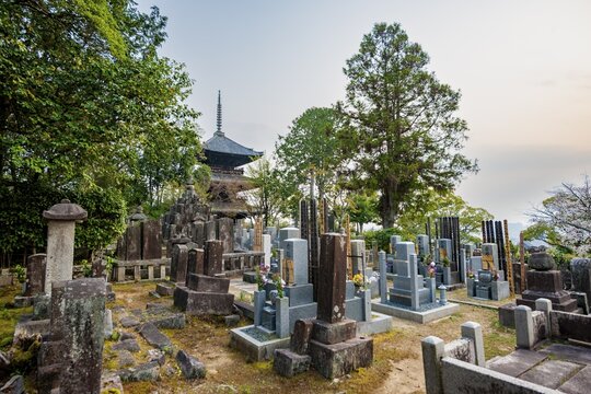 Tombstones at cemetery and three-story pagoda, Konkai-Komyoji Temple, Kurodanichō, Kyoto, Japan