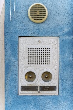 Bell sign on a blue house wall, Burano Island, Venice, Veneto, Italy