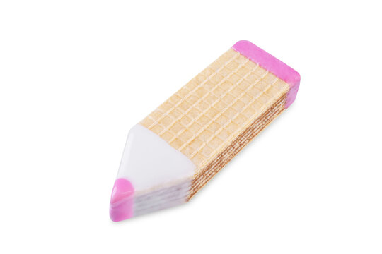 Chocolate wafers in the shape of pencils on a white isolated background