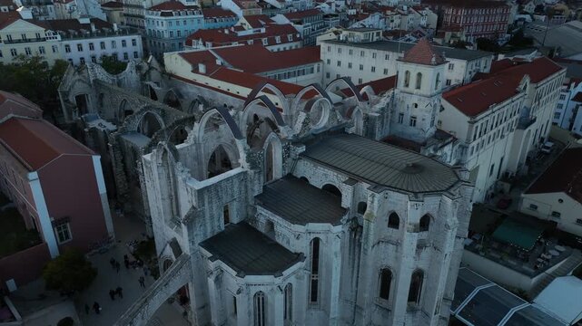 Cinematic Aerial View of Ancient Gothic Church in Lisbon Portugal at Golden Hour