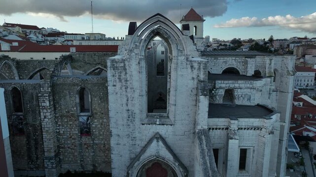 Cinematic Aerial View of Ancient Gothic Church in Lisbon Portugal at Golden Hour