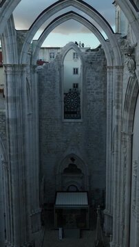 Cinematic Aerial View of Ancient Gothic Church in Lisbon Portugal at Golden Hour