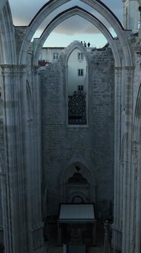 Cinematic Aerial View of Ancient Gothic Church in Lisbon Portugal at Golden Hour