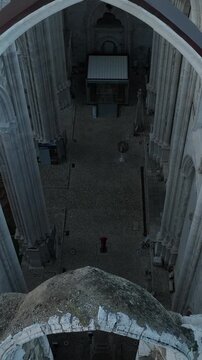 Cinematic Aerial View of Ancient Gothic Church in Lisbon Portugal at Golden Hour