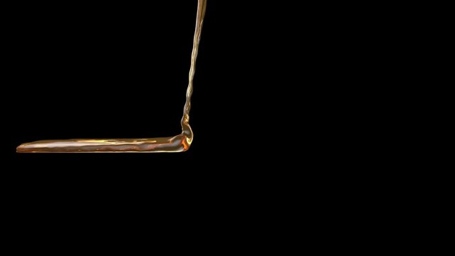 a stream of liquid chocolate pouring down on a flat surface