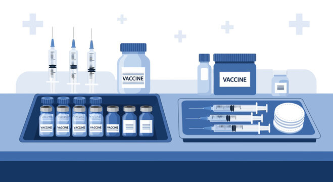Vaccine vials and syringes arranged for medical administration, healthcare concept