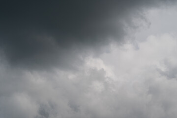 Fototapeta premium Dark clouds foster brighter hopeful visions. Turbulent weather leads to renewed optimism and light. Stormy skies and fierce gales spark renewed faith in brighter days ahead