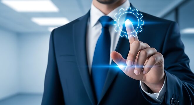 Automation gear icon touched by a professional businessman in a bright office environment with soft bokeh. Ideal for corporate efficiency and digital transformation marketing.