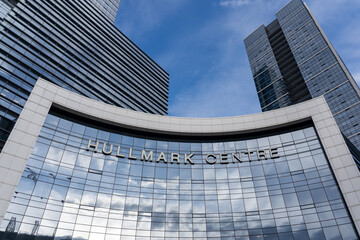 Naklejka premium Toronto, Ontario, Canada - May 6, 2026: Hullmark Centre at Yonge Street and Sheppard Avenue in North York, Toronto, Canada. The Hullmark Centre is a prominent mixed use development. 