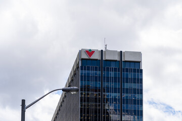 Naklejka premium Toronto, Ontario, Canada - May 11, 2026: Canadian Tire Corporation headquarters building on Yonge Street in Toronto, Canada. Canadian Tire Corporation, Limited is a Canadian retail corporation. 